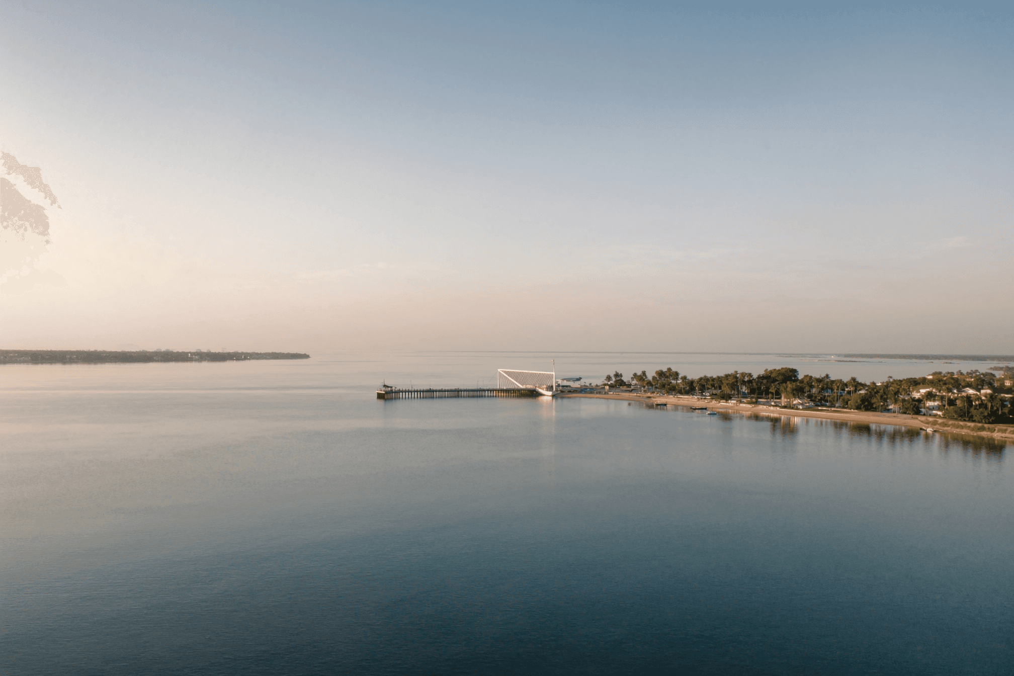 St. Petersburg waterfront and pier across Tampa Bay at dawn